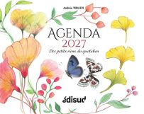 Couverture de l'Agenda 2027 "Des petits riens du quotidien" d'Andrée Terlizzi aux Éditions Édisud. Le visuel à l'aquarelle représente une couronne florale printanière garnie de papillons, de fleurs roses et de feuilles de ginkgo jaunes.