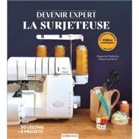 Couverture du livre "Devenir expert : la surjeteuse" de Huguette Paillettes (Éditions de Saxe). Une belle surjeteuse blanche enfilée de fils moutarde est posée à côté de ciseaux et d'un mètre ruban.